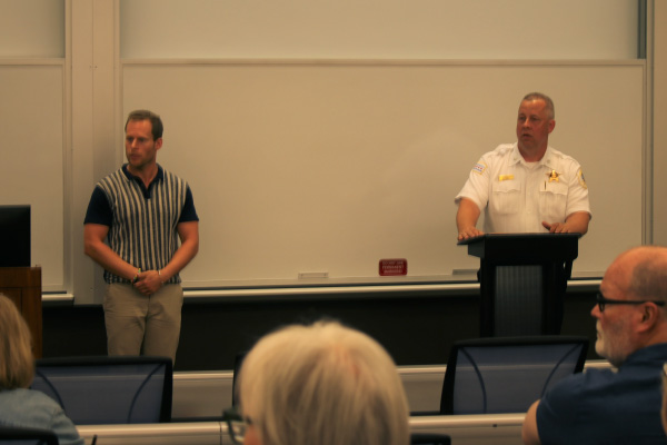 18th District Police Commander, Michael Barz, answers questions at a DePaul hosted community meeting.