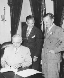 President Harry Truman signing the Fulbright Act, August 1, 1946