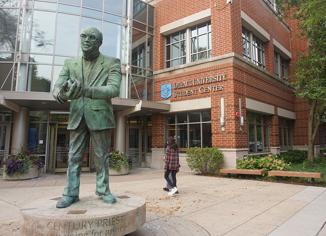 Fr. Egan statue in front of Student Center 2021