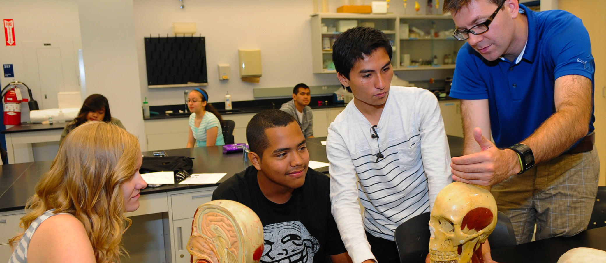 Students engaged in a lab presentation